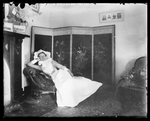 Nurse reclining on couch, Gundagai, New South Wales [picture] / Charles Gabriel