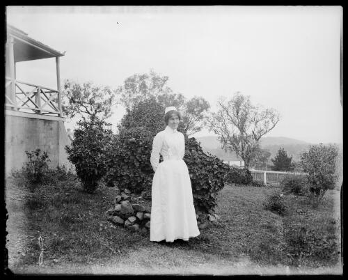Nurse in the grounds of the old hospital, Gundagai, New South Wales [picture] / Charles Gabriel