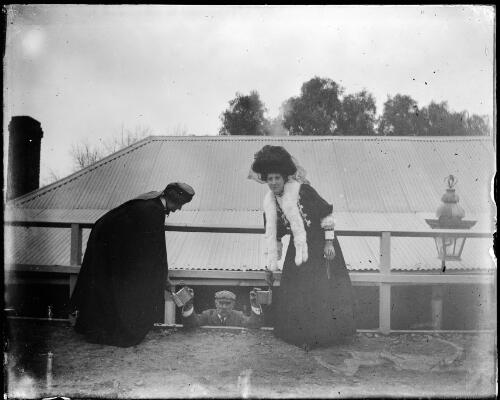 Matron Young and Mrs. Spiller collecting for the Red Cross in Sheridan Street, outside the Criterion Hotel, Gundagai, New South Wales, ca. 1900 [picture] / Charles Gabriel