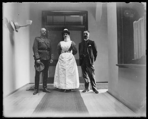 Military officer standing with Matron Young and a man at Gundagai hospital, New South Wales, ca. 1904 [picture] / Charles Gabriel