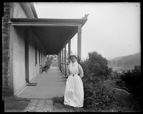 Nurse on the veranda of the hospital in Otway Street, Gundagai, New South Wales, ca. 1900 [picture] / Charles Gabriel