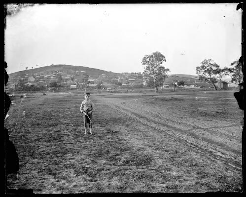 Boy standing on the floodplain at Gundagai, New South Wales [picture] / Charles Gabriel