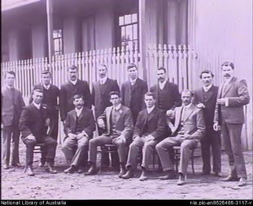 Group of men in front of the Burraga Hotel, Burraga, New South Wales [picture] / E.A. Lumme