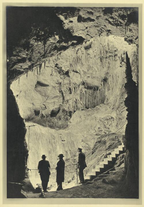 [Three men in a chamber of Jenolan Caves] [picture] / Frank Hurley