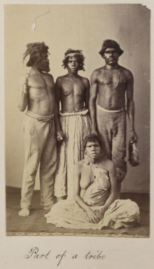 Studio portrait of three Australian Aboriginal men and a woman, Queensland, ca. 1870 [picture]