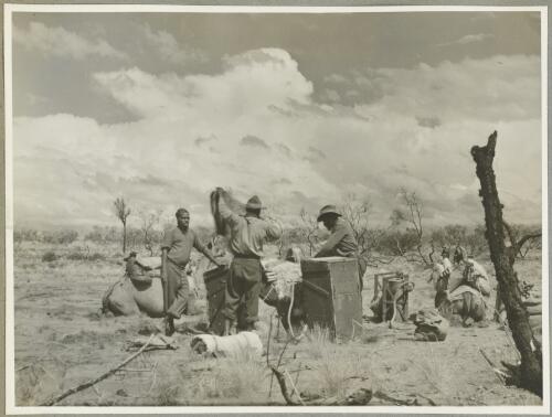 Breaking camp on approach to Uluru, Northern Territory, 1947 [picture] / Arthur Groom