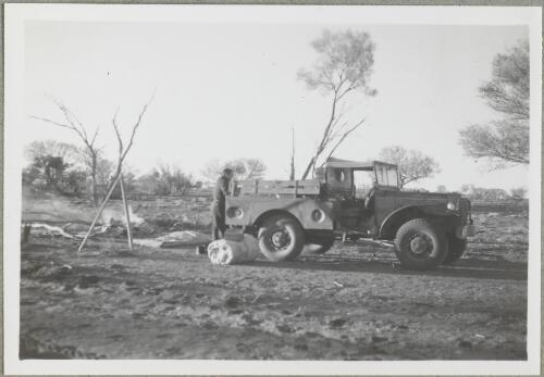 Unidentified man with a light truck and surveying equipment, Northern Territory, 1947, 2 [picture] / Arthur Groom