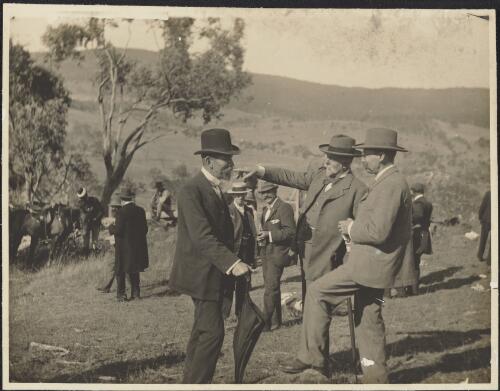 Discussing the site at Tumut [picture] / [E.T. Luke]