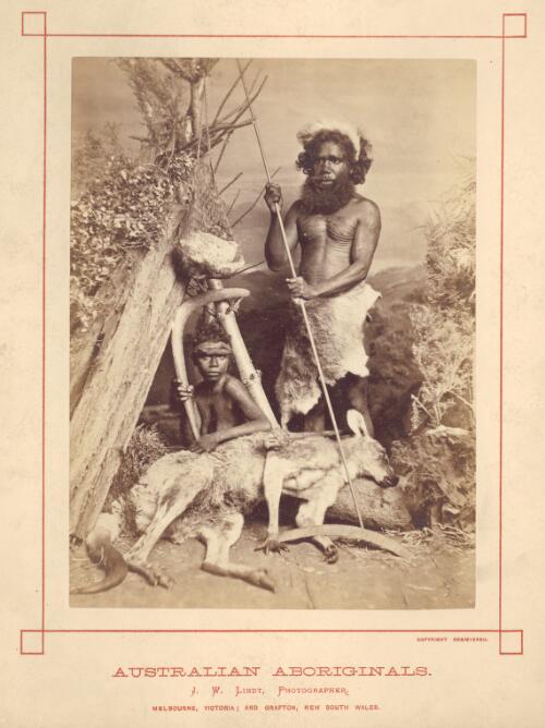 Studio portrait of an Aboriginal Australian man and woman with hunting weapons and a dead kangaroo, ca. 1873 [picture] / J.W. Lindt