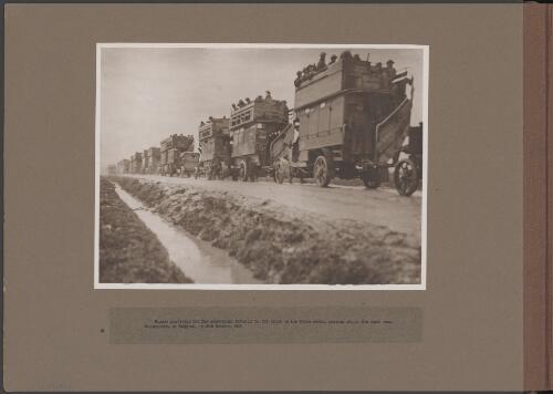 Buses transporting Australian soldiers to the front, Ypres sector, Belgium, 26 October 1917 [picture] / Frank Hurley