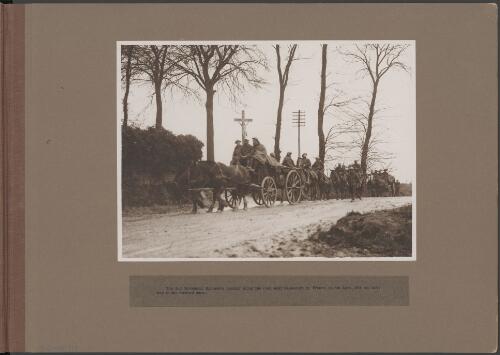 Australian Engineers on horseback and carriage passing along the road near Beaucourt, France, April 1918 [picture] / Frank Hurley