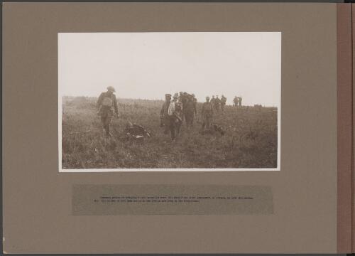 German prisoners bringing in the wounded from the battlefield near Jeancourt, France, 18 September 1918 [picture] / Frank Hurley