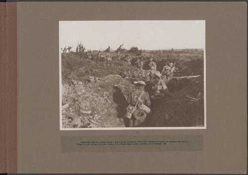 Australian Infantry passing along a sap towards Guillemont Farm, near Ronssoy, France, 1 October 1918 [picture] / Frank Hurley