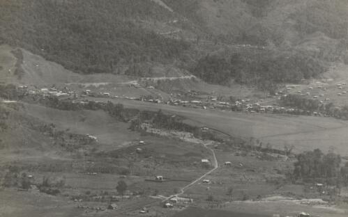 Wau, a mining town of the New Guinea goldfields, at 3800 feet above sea-level [picture] / Albert T. Simmons