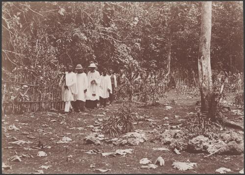 Clergymen and villagers during consecration of a graveyard at Tegua, Torres Islands, 1906  / J.W. Beattie