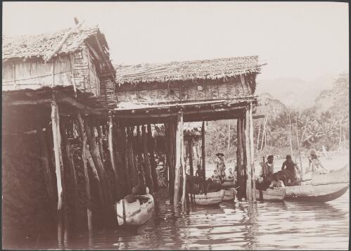 Food houses of the men's landing on Ferasiboa, Solomon Islands, 1906 / J.W. Beattie