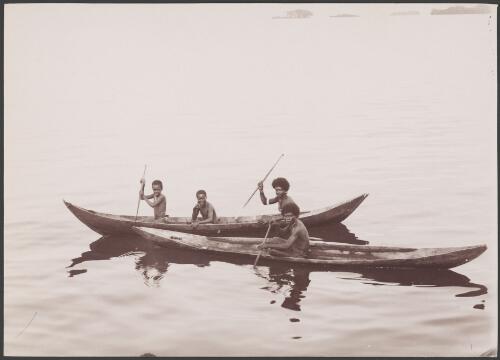 People of Choiseul in two canoes on the Pachu River, Solomon Islands, 1906 / J.W. Beattie