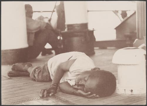 Henry Marau asleep on the deck of the Southern Cross, 1906 / J.W. Beattie