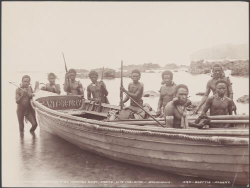 Cannibals standing around the mission boat at Foate, Malaita, Solomon Islands, 1906 / J.W. Beattie