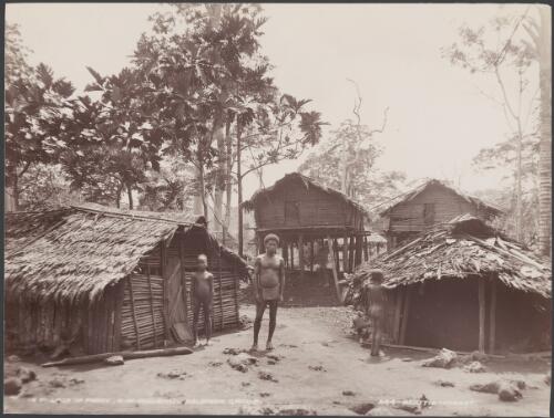 A man and two children in the village of Foate, Malaita, Solomon Islands, 1906 / J.W. Beattie