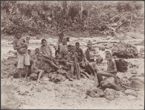 Women and children on a beach at Foate, Malaita, Solomon Islands, 1906 / J.W. Beattie