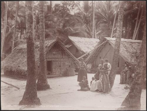 Women and children in the village of Kombe, Florida, Solomon Islands, 1906 / J.W. Beattie