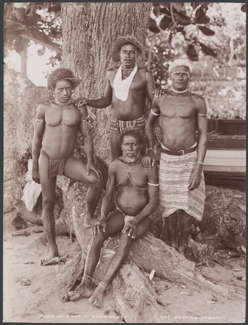 Four men of Savo, Solomon Islands, 1906 / J.W. Beattie