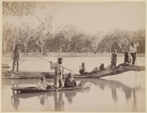 Group of Aboriginal Australian people fishing from the banks and a bark canoe, lower Murray River near Chowilla Station, South Australia, 1886 [picture] / Charles Bayliss