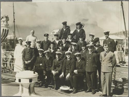 Officers and crew of the Discovery on arrival in Cape Town, South Africa, ca. 1929 [picture] / Frank Hurley