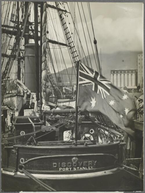 The Australian flag on board the Discovery, Cape Town, South Africa, ca. 1929 [picture] / Frank Hurley