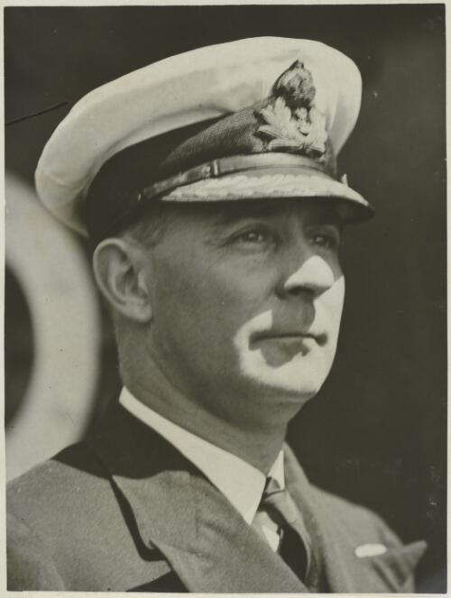 Instructor Commander Morton Moyes on board the Discovery with the B.A.N.Z. Expedition, ca. 1930 [picture] / Frank Hurley