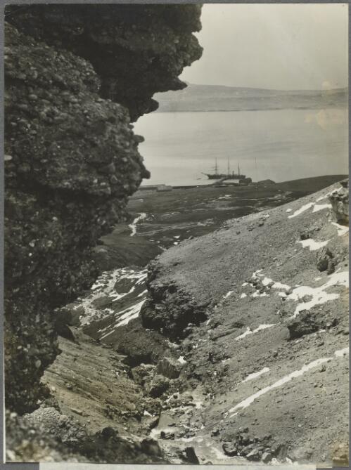 The Discovery moored at Port Jeanne d'Arc, Kerguelen Islands, ca. 1930 [picture] / Frank Hurley