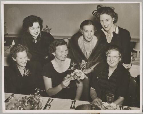 Nancy Walton, Audrey Tomlinson, Peggy Kirk, Maud Gardner, Jacqueline Smith and Lores Bonney at a dinner for Peggy Kirk at Princes, 1953 [picture]