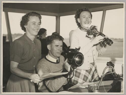 Senja Robey, Air Traffic Control Officer Doug Hook and Alix Newbigin (from left) in the control tower at Bankstown Aerodrome during the second Australian Women Pilots' Association Reliability Trials, Sydney, September 1954 [picture]