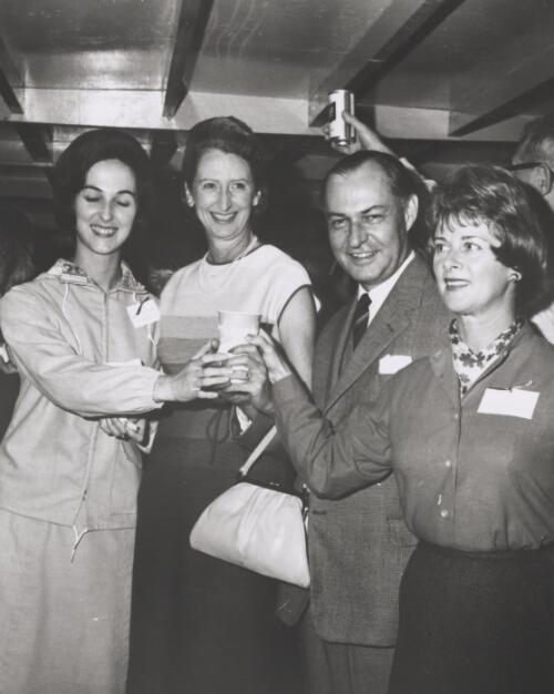 Sir Keith Waller standing with his wife Lady Waller and two women at the annual YWCA bazaar, Australian stall, Washington, ca. 1968 [picture]