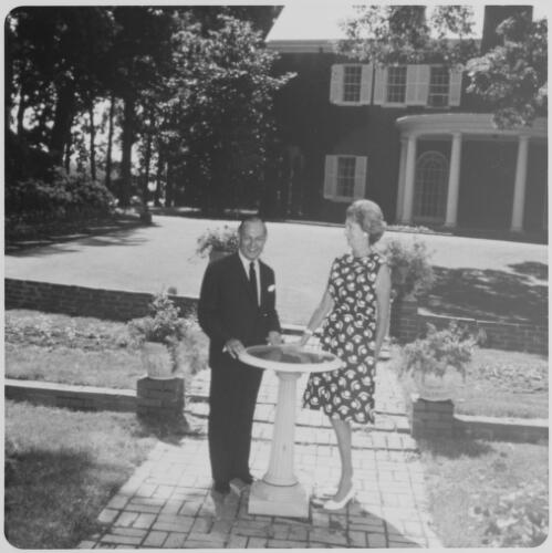 Lady Waller and Sir Keith Waller in the side garden of the Australian Embassy, Washington DC, approximately 1967