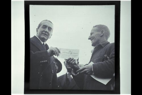 Presentation of cheque by Rt. Hon. S.M. Bruce to Charles Kingsford Smith [picture] / W.J. Mildenhall