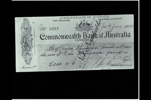 Cheque presented to Kingsford Smith [picture] / W.J. Mildenhall
