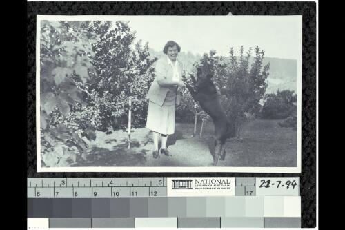 Enid Herring and the dog 'Boofie' in the garden at 'Sheen' [picture]