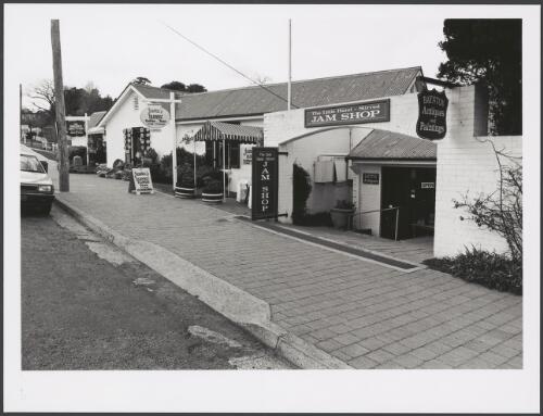 Berrima NSW : Row of shops on east side of Old Hume Highway [picture] / photography by Raymond de Berquelle
