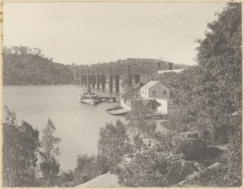 Boat docked near bridge over Georges River at Como, New South Wales, ca. 1900 [picture] / Charles Bennett