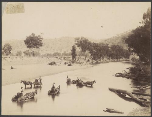 Five men filling water barrels on horse carts, Murrumbidgee River, Gundagai, New South Wales, ca. 1886, 2 [picture] / Charles H. Kerry