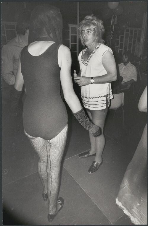 Fishnet stockings and man in drag at the fancy dress ball at the pub in Tennant Creek, Northern Territory, 8 April 1972 [picture] / Bruce Howard