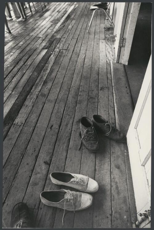 Shoes at the door of the hotel at Maxwelton, Queensland, ca. 1971 [picture] / Bruce Howard