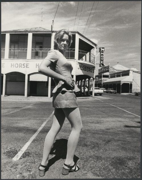 Barmaid outside the White Horse Hotel, Charters Towers, Queensland, ca. 1972 [picture] / Bruce Howard