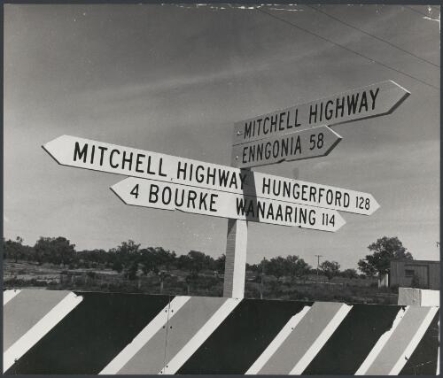 Road signs on the Mitchell Highway outside the pub at North Bourke, New South Wales, ca. 1972 [picture] / Bruce Howard