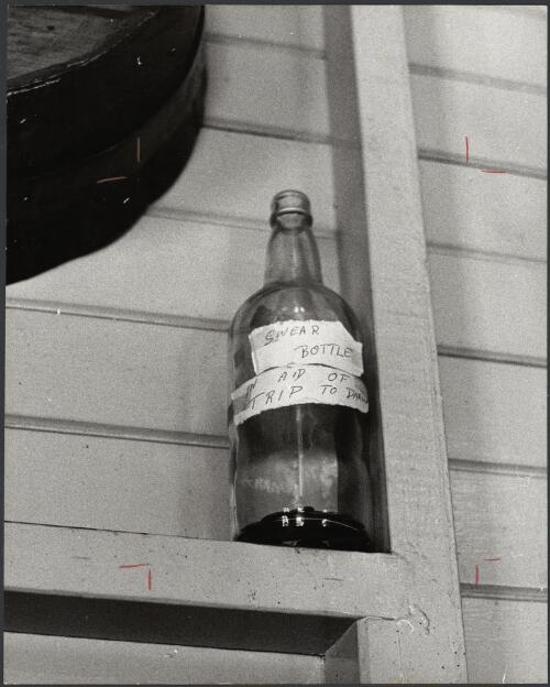 Swear bottle at the Marlborough Hotel, Central Queensland, ca. 1972 [picture] / Bruce Howard