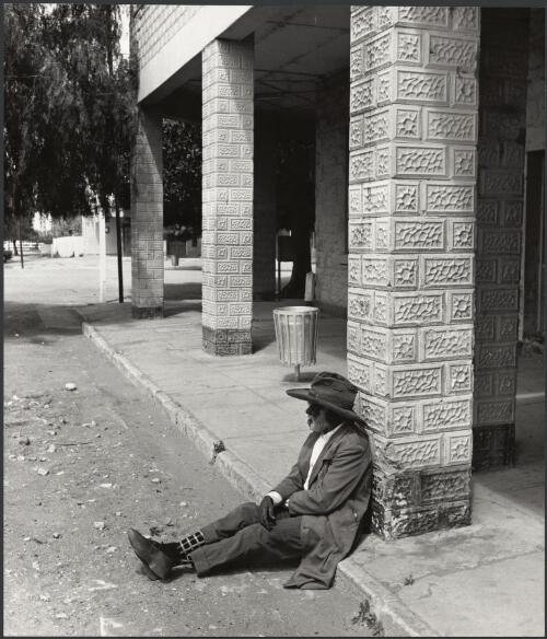 Patrick McFarlane sitting on the pub verandah, Wilcannia, New South Wales, ca. 1972 [picture] / Bruce Howard