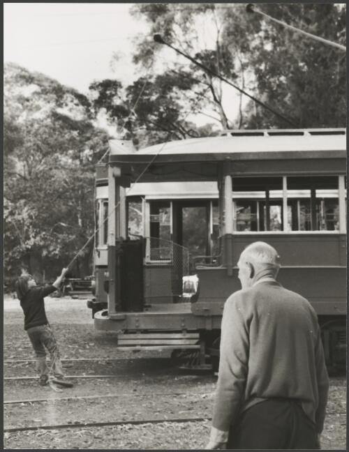 Child attaching the tram to the power cable at the Sydney Tramway Museum, Loftus, New South Wales, ca. 1976 [picture]