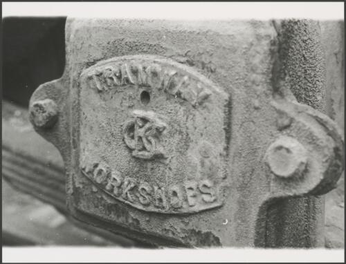 Name plate of the Greater Brisbane Tramways Workshops on the undercarriage of a tram at the Brisbane Tramway Museum, Queensland, ca. 1976 [picture]